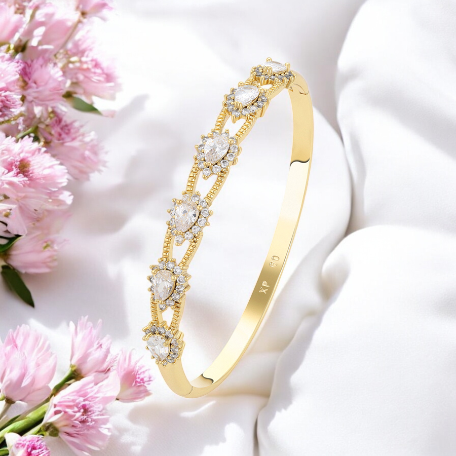 Позлатена твърда гривна с камъчета