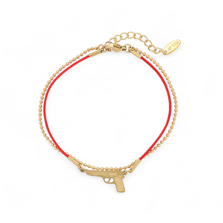 Позлатена гривна с червен конец и пистолет